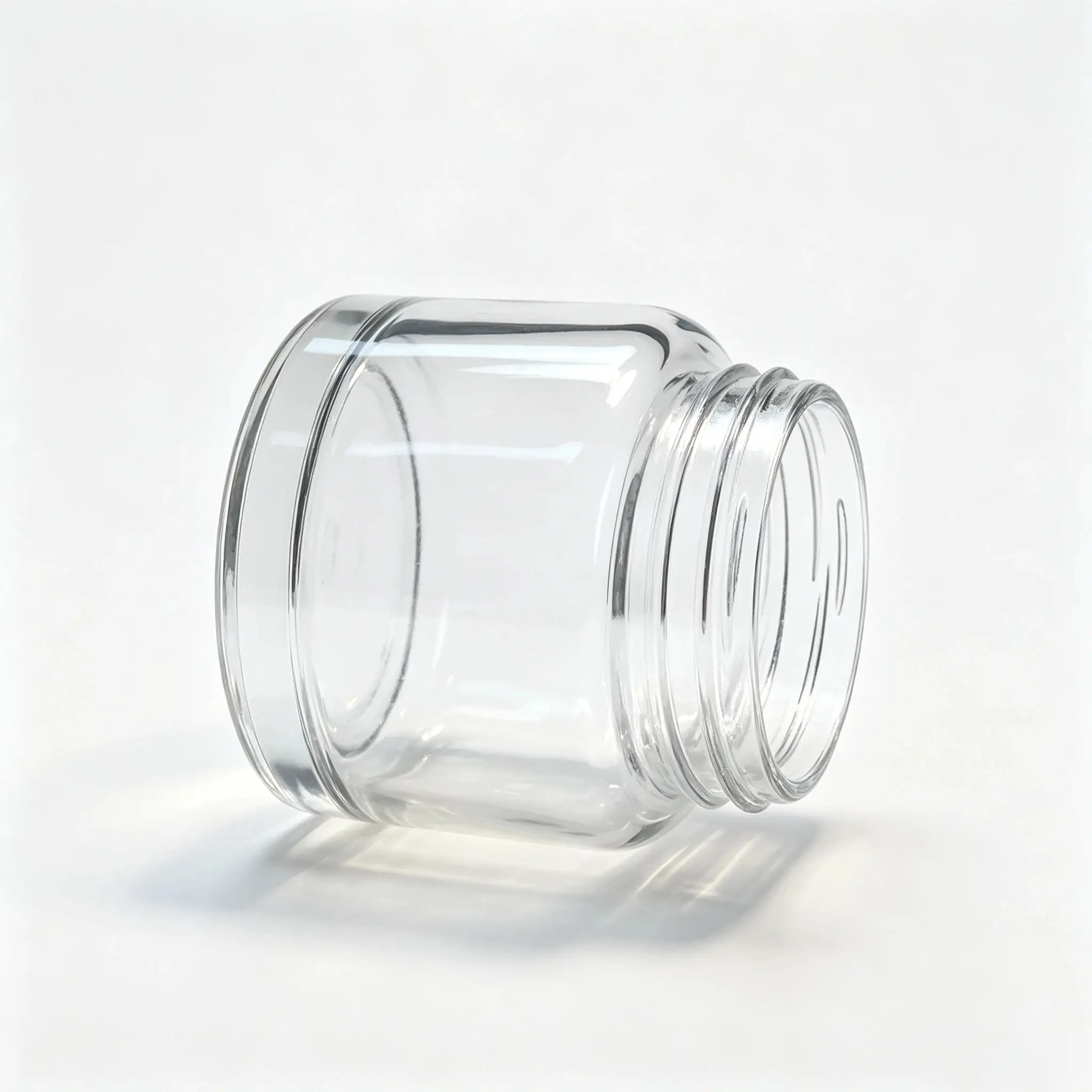 100g Glass Face Cream Jar Side View Side view of the 100g glass face cream jar showing its compact glass body and overall proportions.