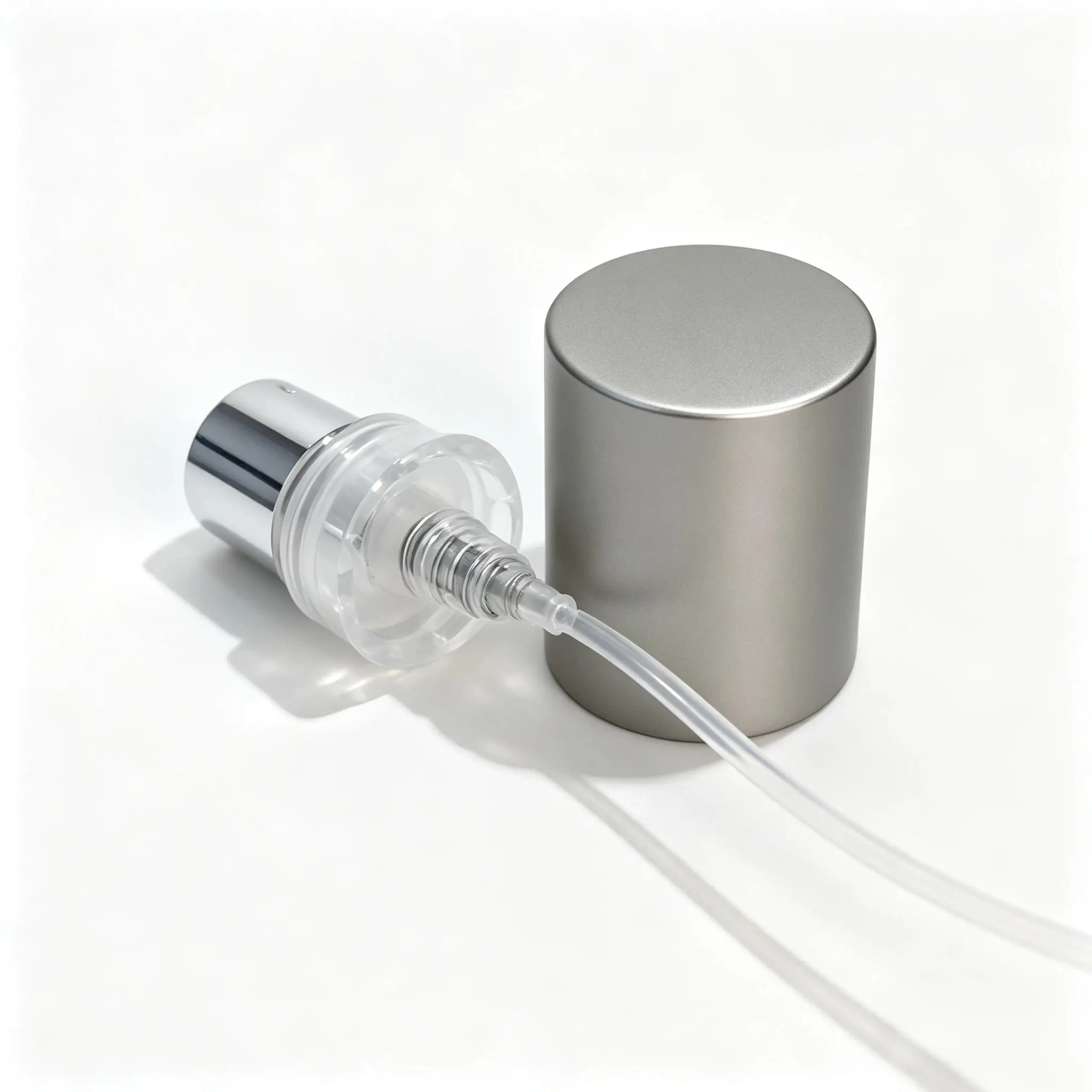 Crimp sprayer and outer cap components displayed separately for the 100ml custom rectangular perfume bottle