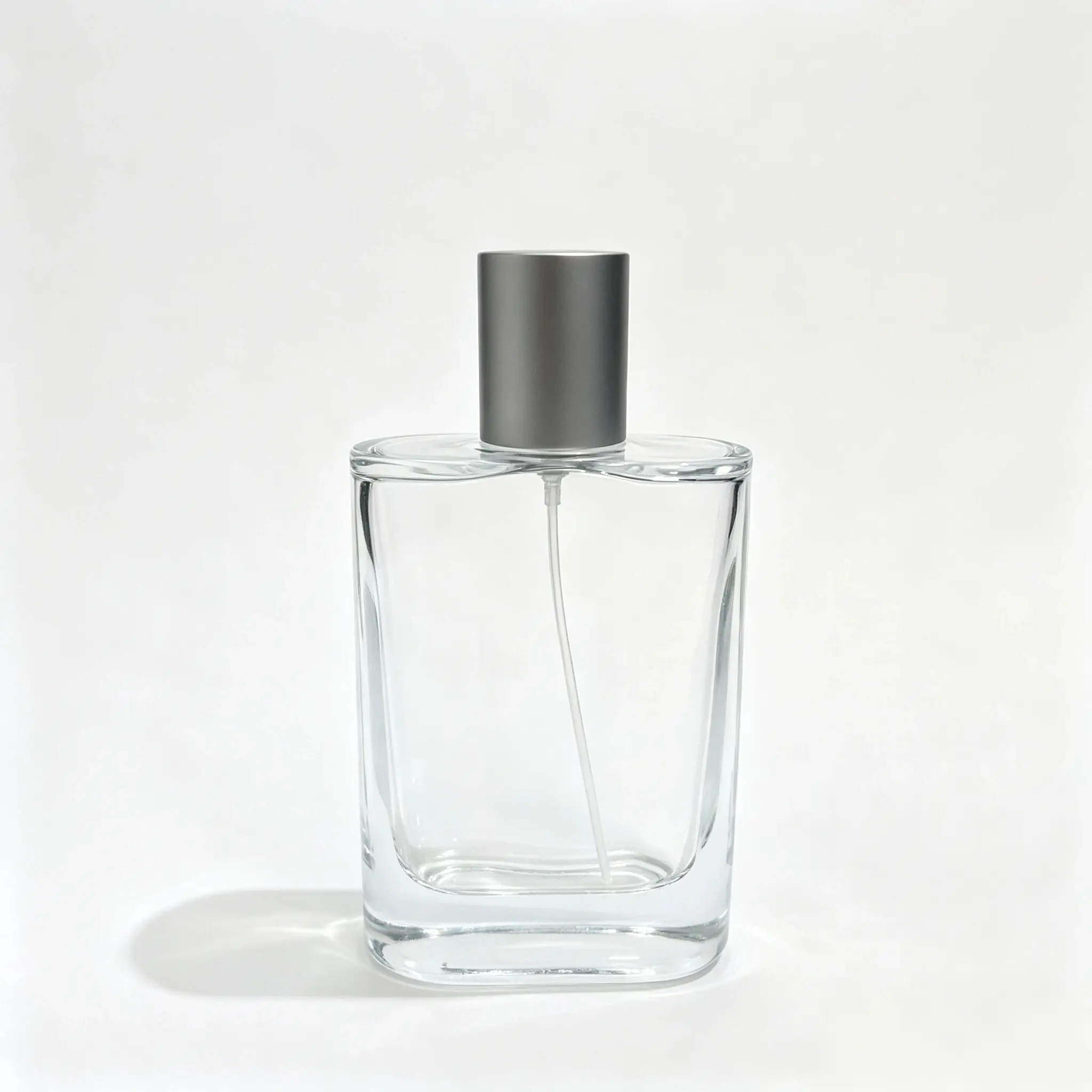 100ml custom rectangular perfume bottle shown in complete front view with crimp sprayer and outer cap