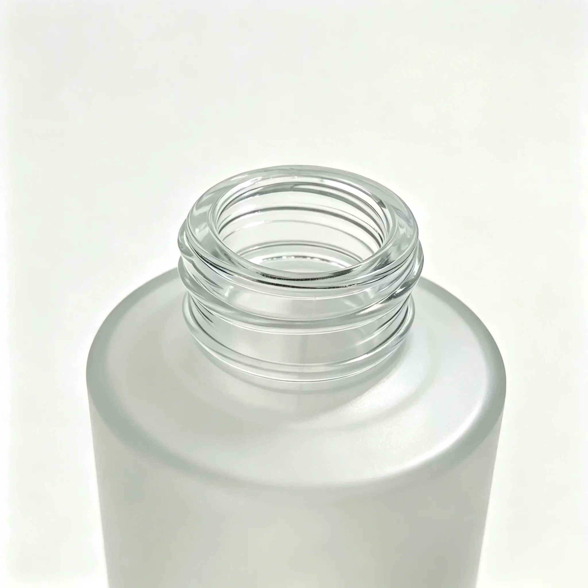 Close-up view of the neck opening on the 100ml frosted glass lotion bottle