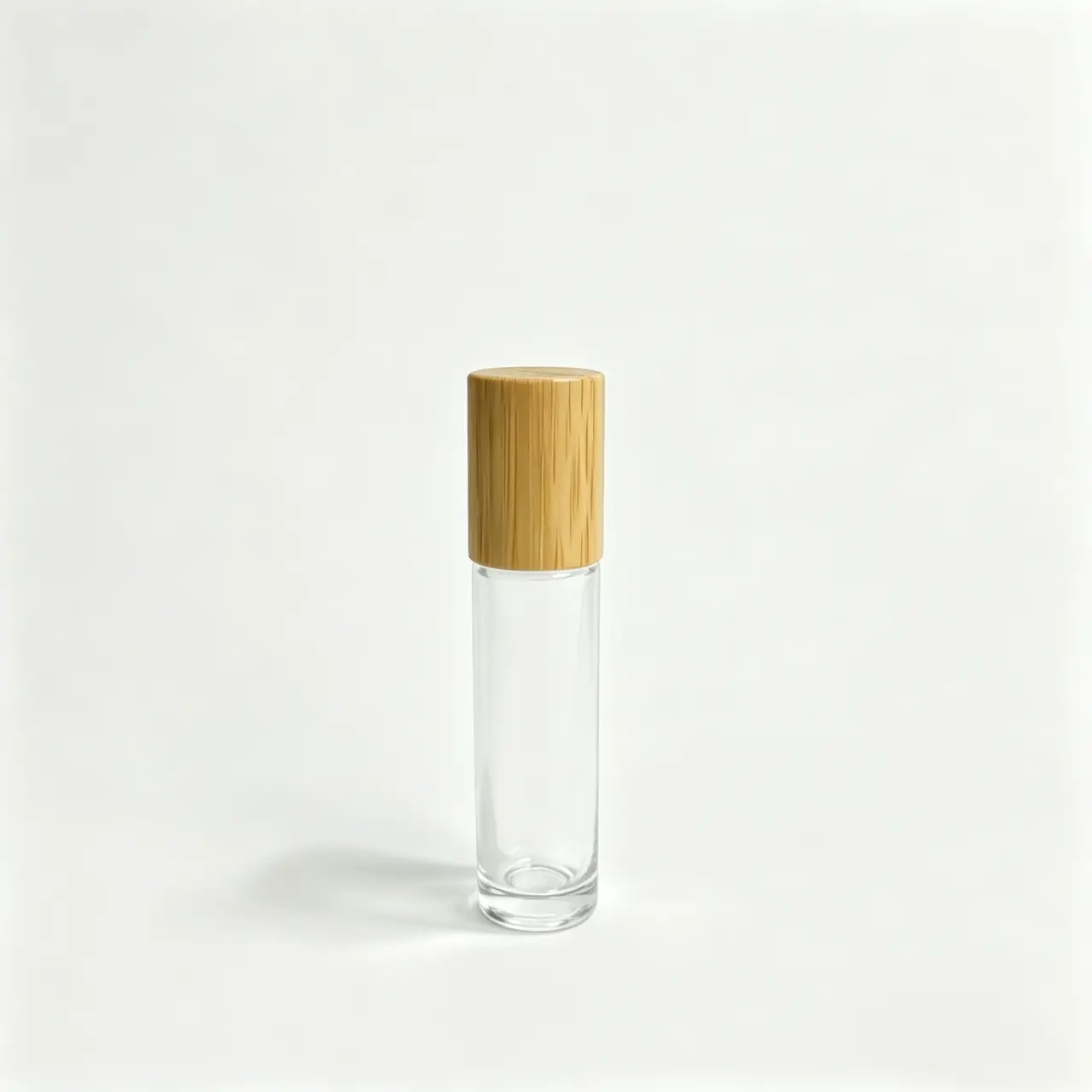 10ml clear glass roller ball perfume bottle shown upright with wooden cap and slim transparent bottle body