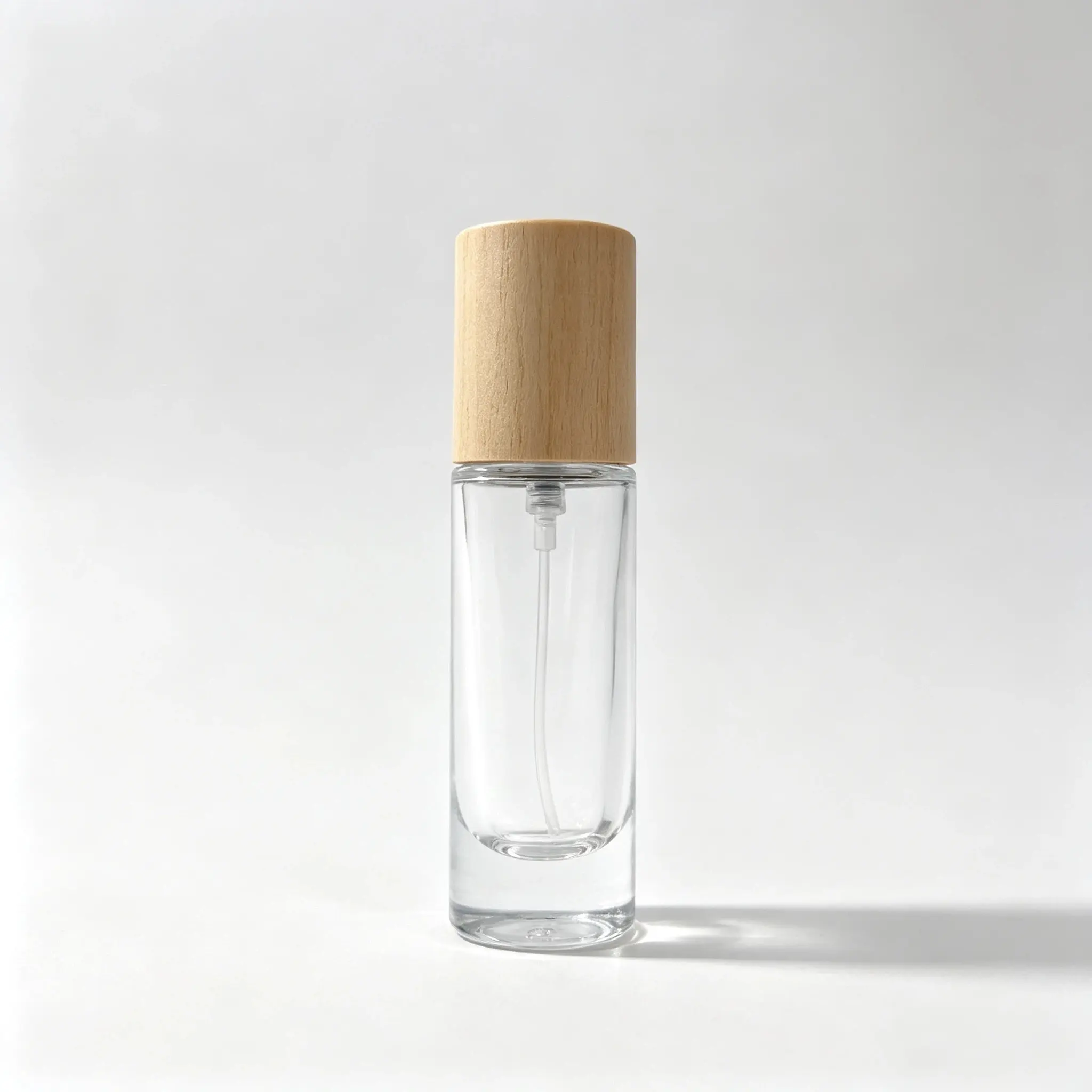 10ml Cylindrical Glass Perfume Bottle Front View 10ml cylindrical glass perfume bottle shown in complete front view with crimp sprayer and outer cap