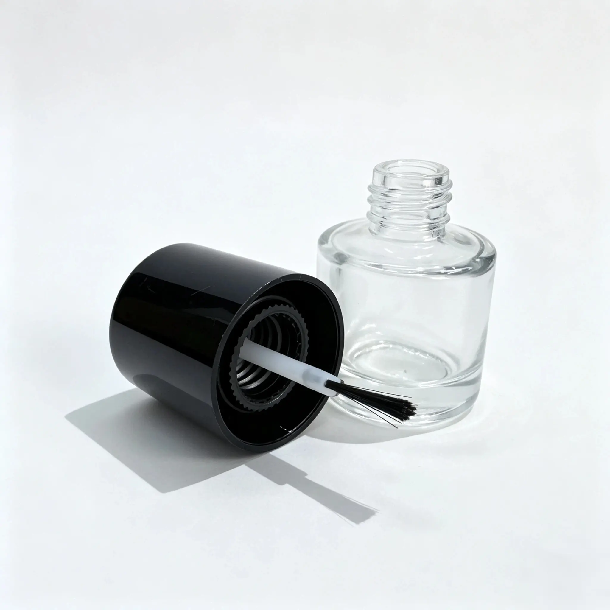 10ml Glass Gel Nail Polish Bottle with Cap and Brush 10ml glass gel nail polish bottle displayed with its separate cap and application brush components