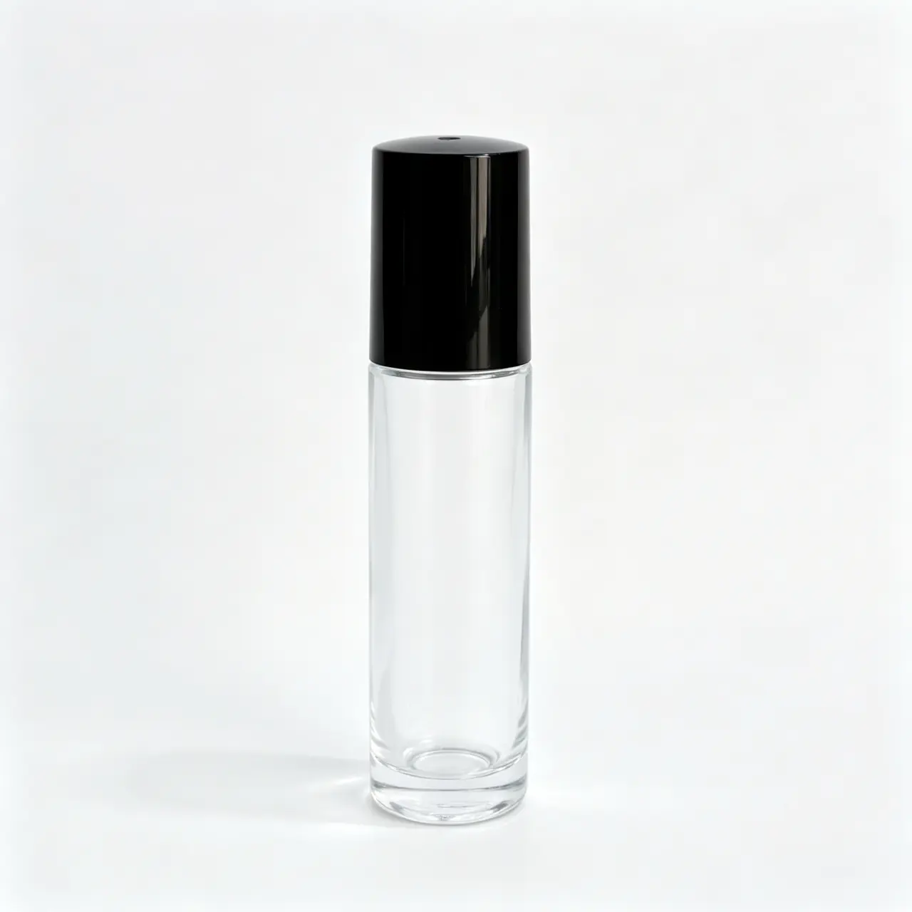 10ml Clear Glass Empty Roll On Perfume Bottle Front View 10ml clear glass empty roll on perfume bottle shown upright with roller applicator and matching cap
