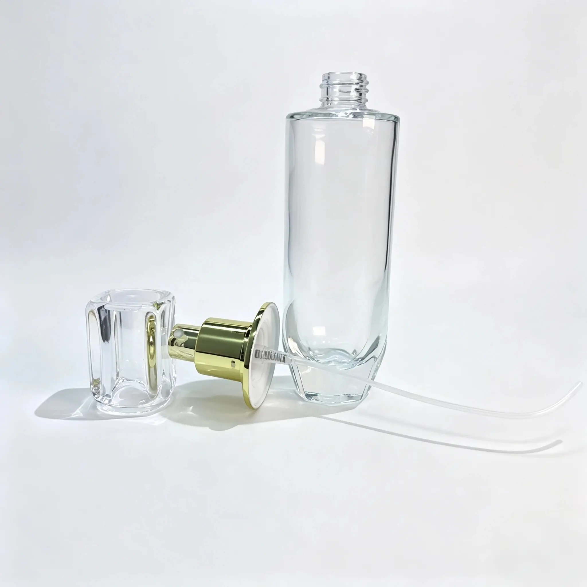120ml Face Toner Spray Bottle with Cap and Pump 120ml face toner spray bottle displayed with its separate spray pump, collar and protective cap components