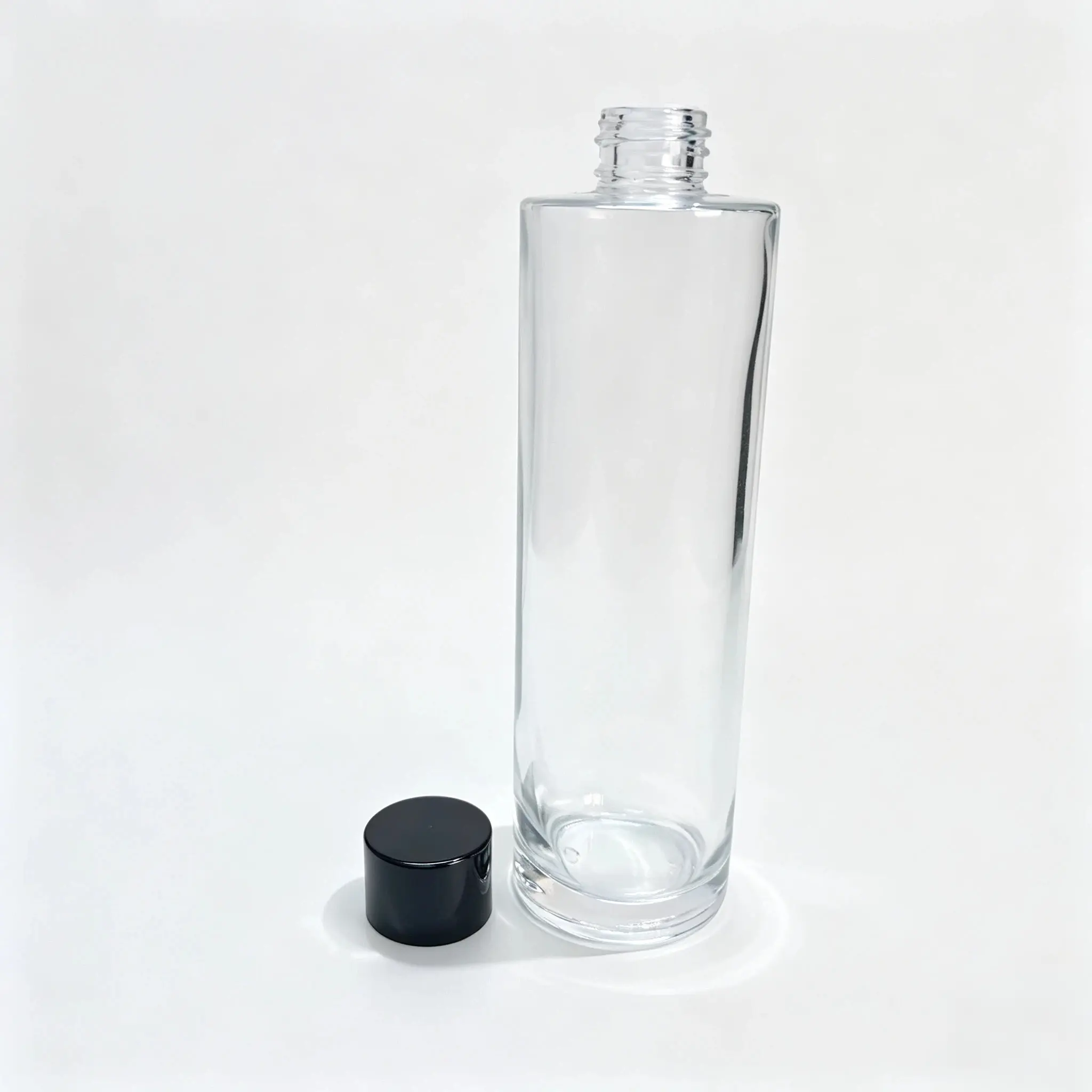 150ml glass facial toner bottle displayed with separate cap and inner plug components