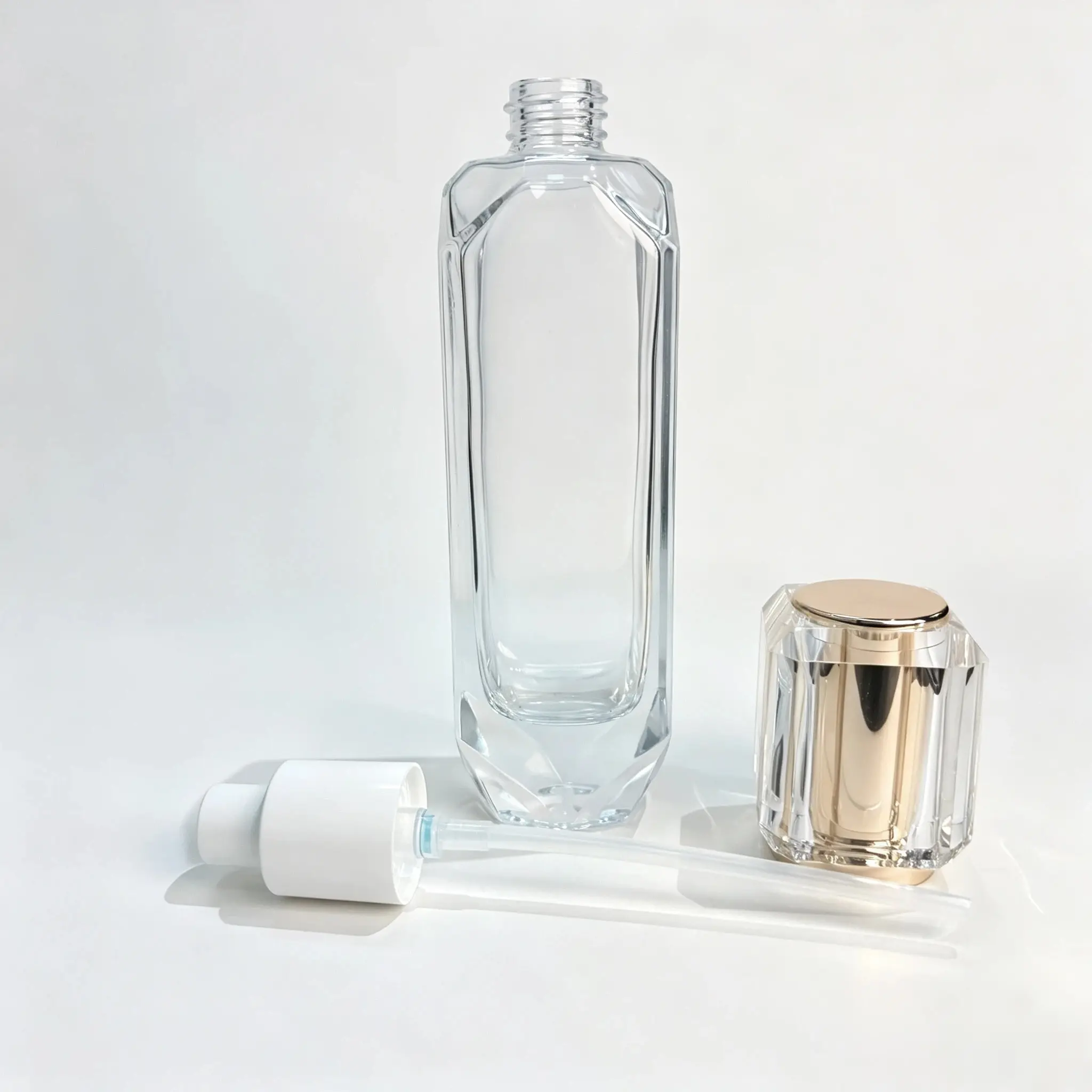 150ml Glass Lotion Pump Bottle With Cap and Pump 150ml glass lotion bottle displayed together with its separate cap and pump dispenser components