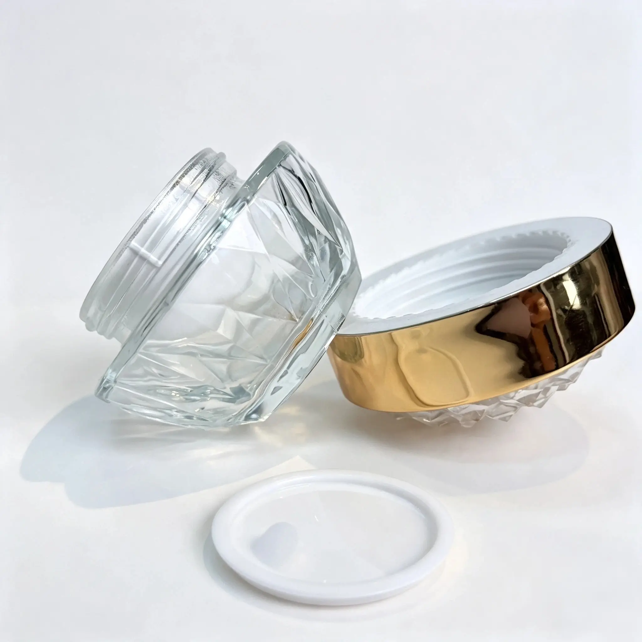 15g Glass Cosmetic Cream Jar with Custom Caps 15g glass cosmetic cream jar displayed with different custom cap concepts for skincare packaging development