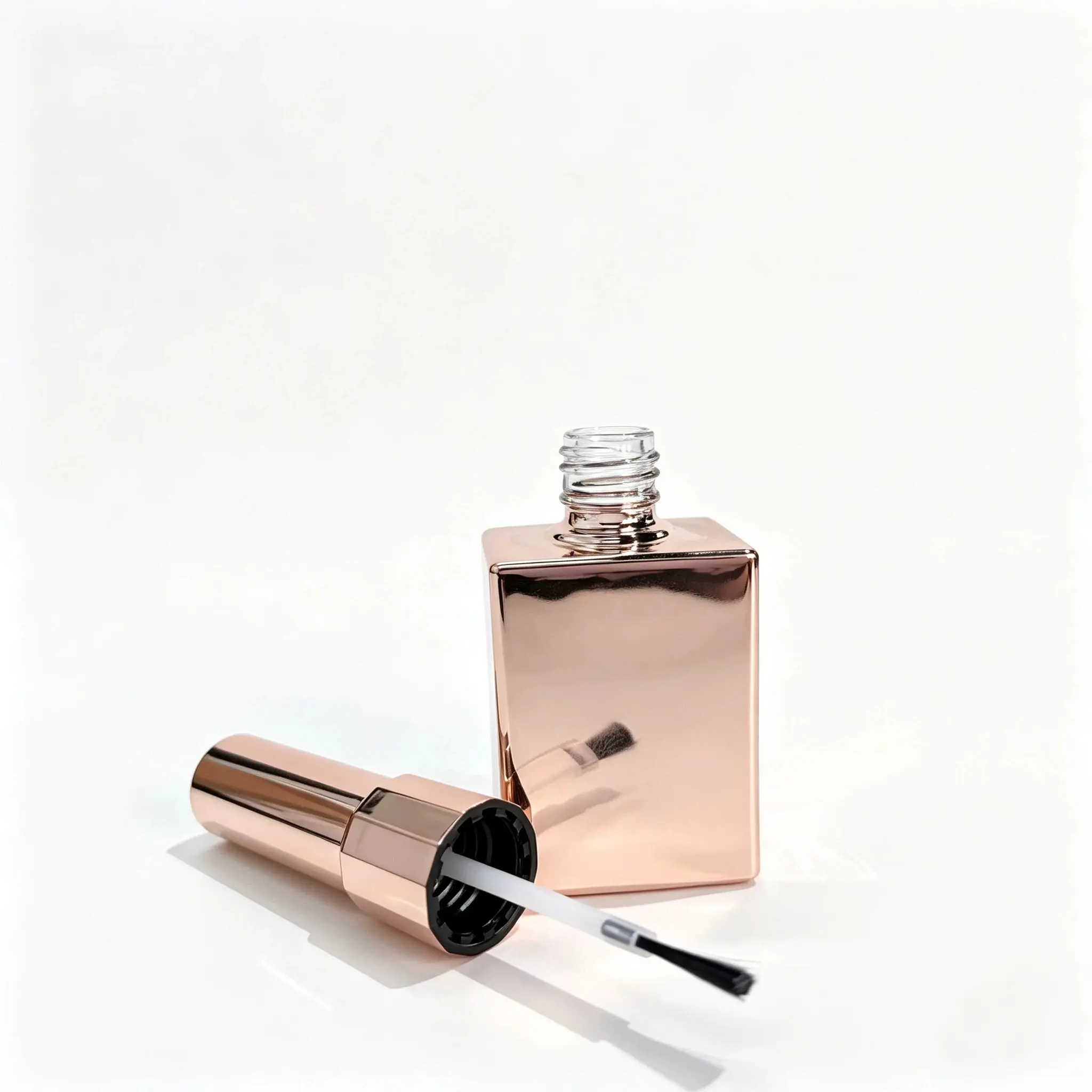 15ml empty nail polish bottle displayed together with its separate cap and brush components