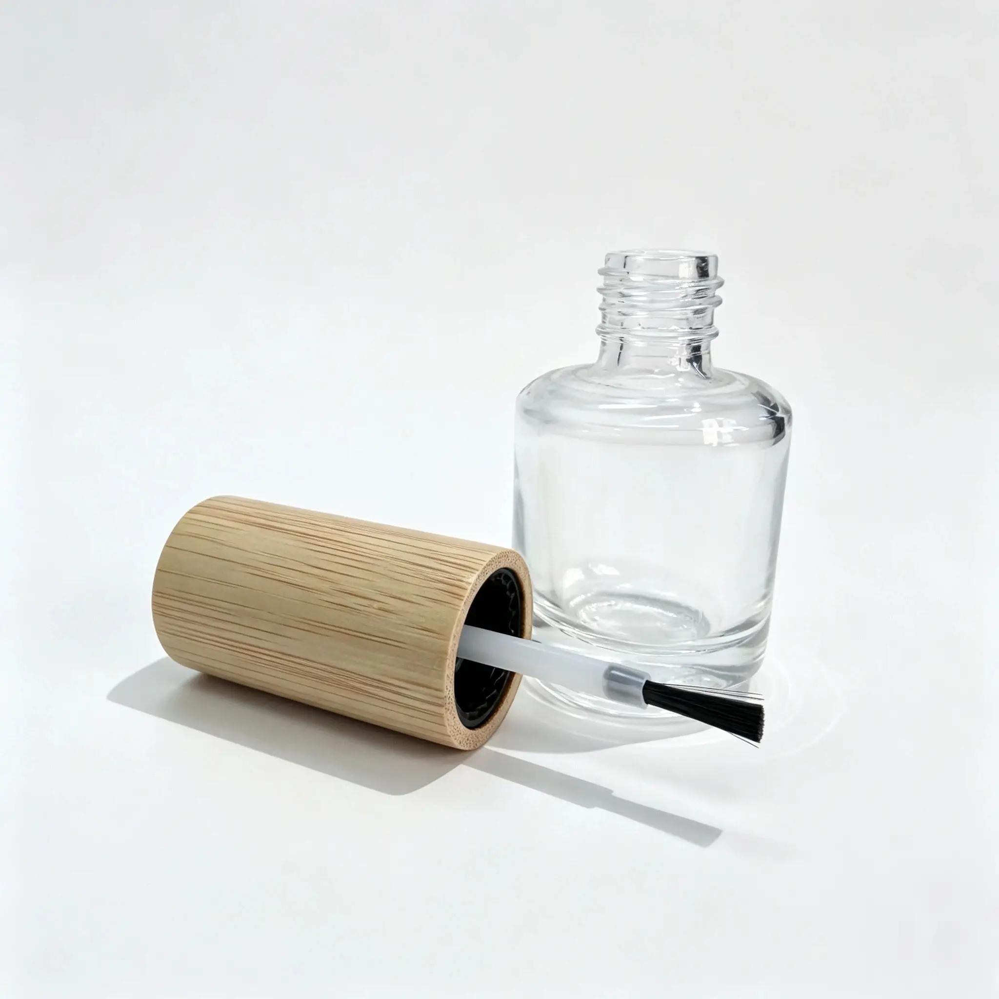 15ml glass nail polish bottle shown with separate brush and cap components