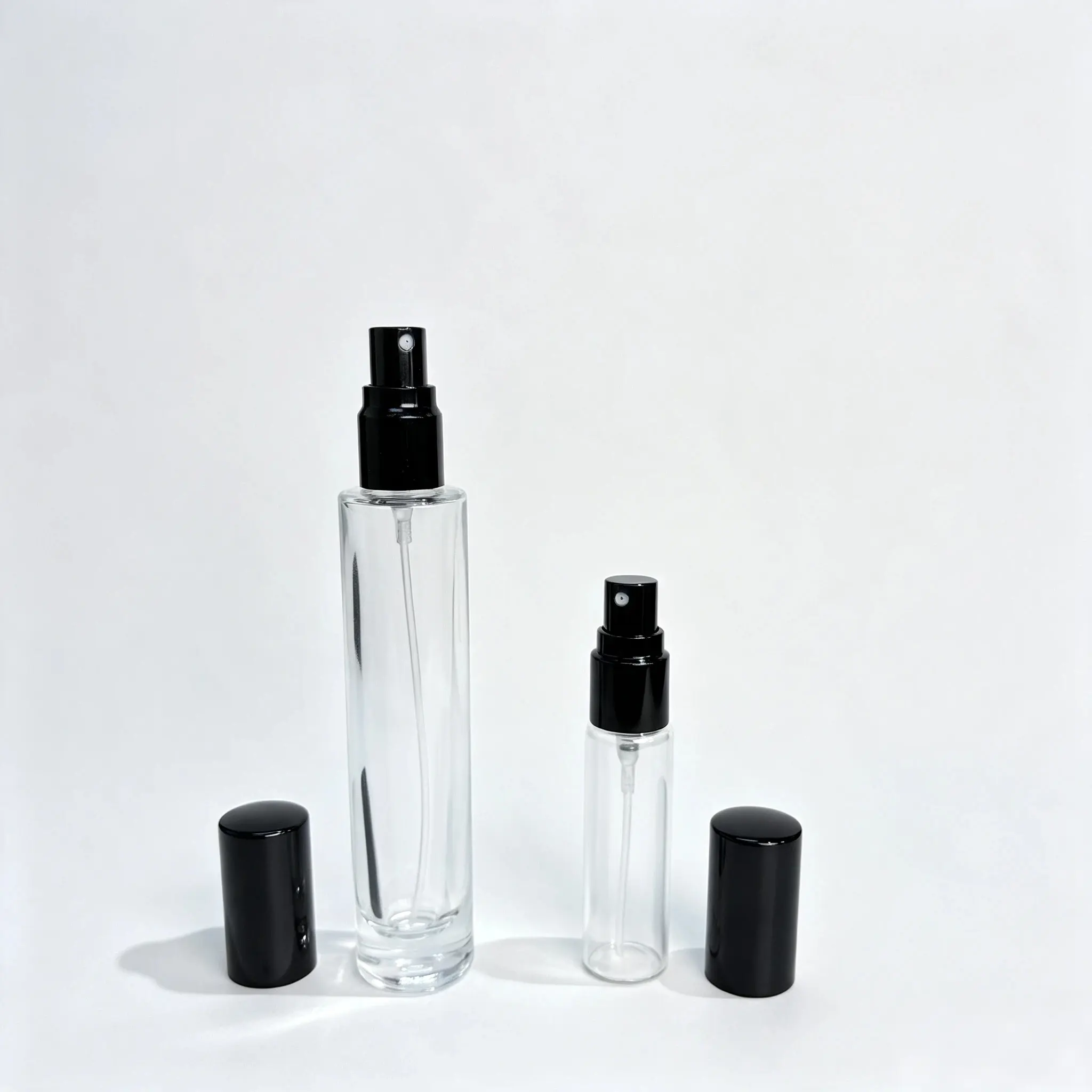 15ml Portable Glass Perfume Spray Bottle with Sprayer and Upright Cap 15ml portable glass perfume spray bottle shown bare with crimp sprayer installed and the outer cap standing separately beside it
