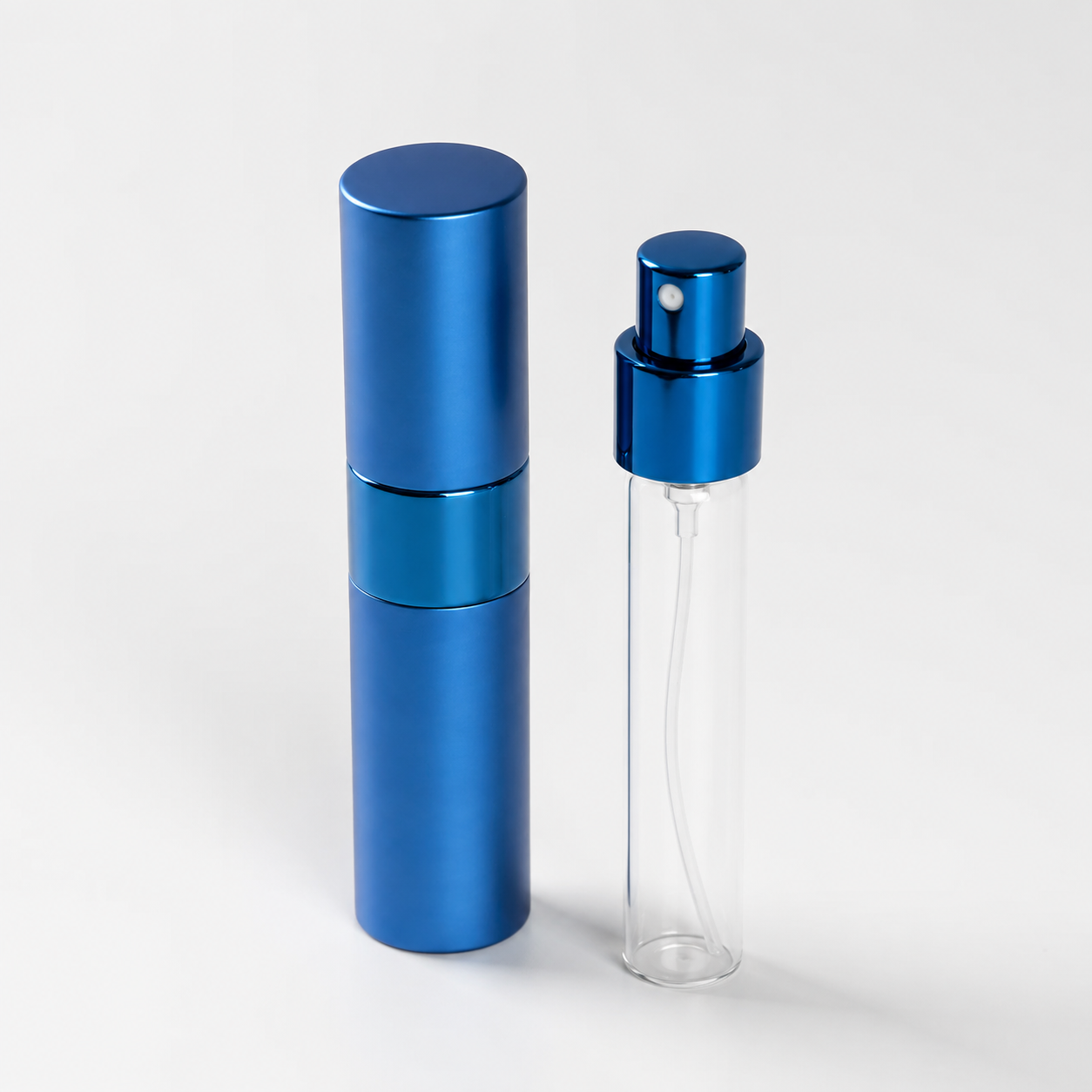 15ml Portable Perfume Atomizer Inner Bottle and Outer Shell 15ml portable perfume atomizer shown with glass inner bottle and cylindrical ABS outer shell separated into two main components