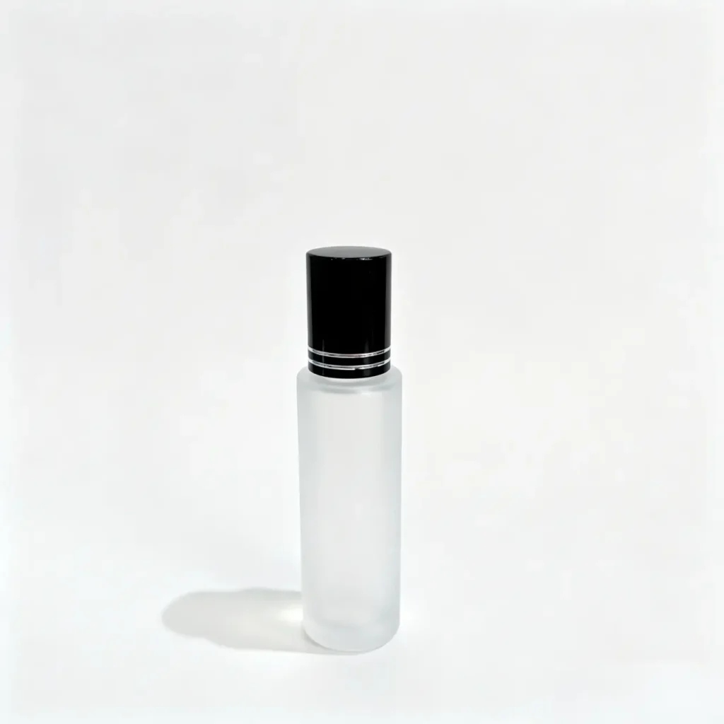 20ml frosted glass roll on perfume bottle shown upright with matching cap and slim cylindrical bottle profile