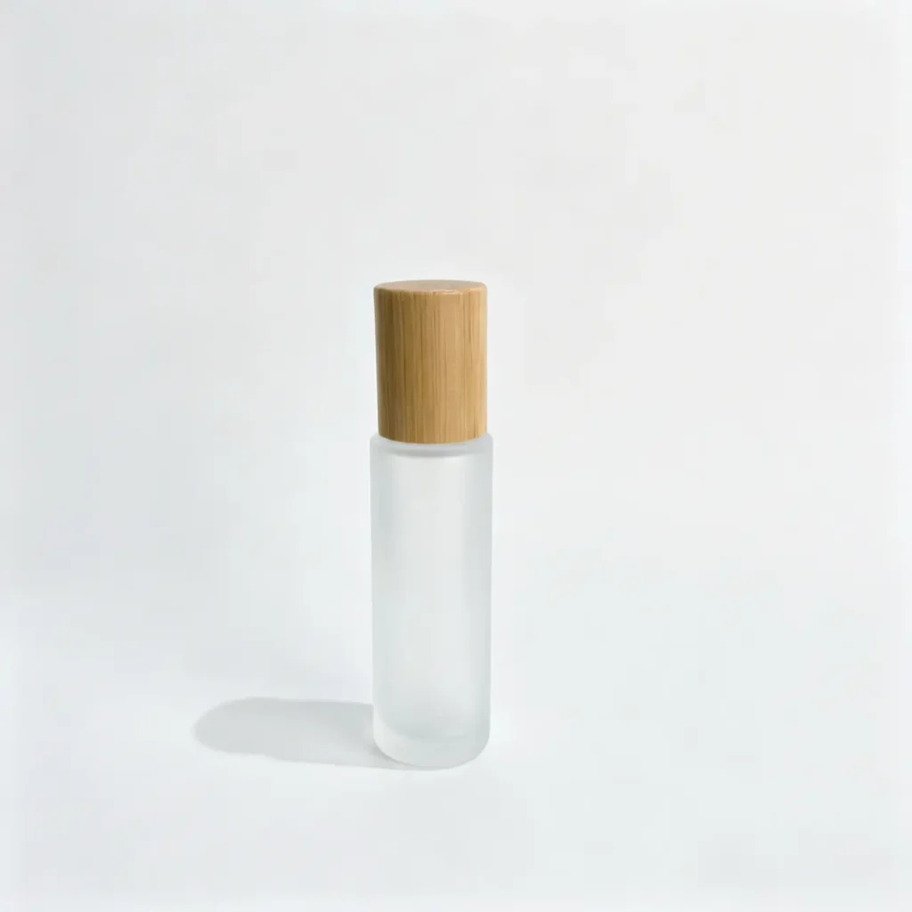 20ml frosted glass roller bottle shown upright with a wooden cap and slim cylindrical perfume packaging profile