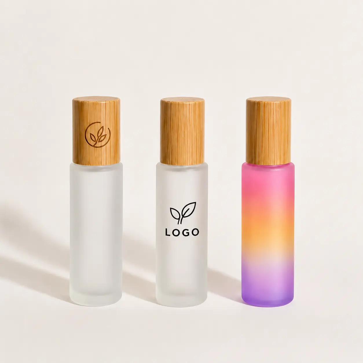 20ml Frosted Glass Roller Bottle Logo Customization Reference 20ml frosted glass roll on perfume bottle with wooden cap displayed with custom logo decoration examples