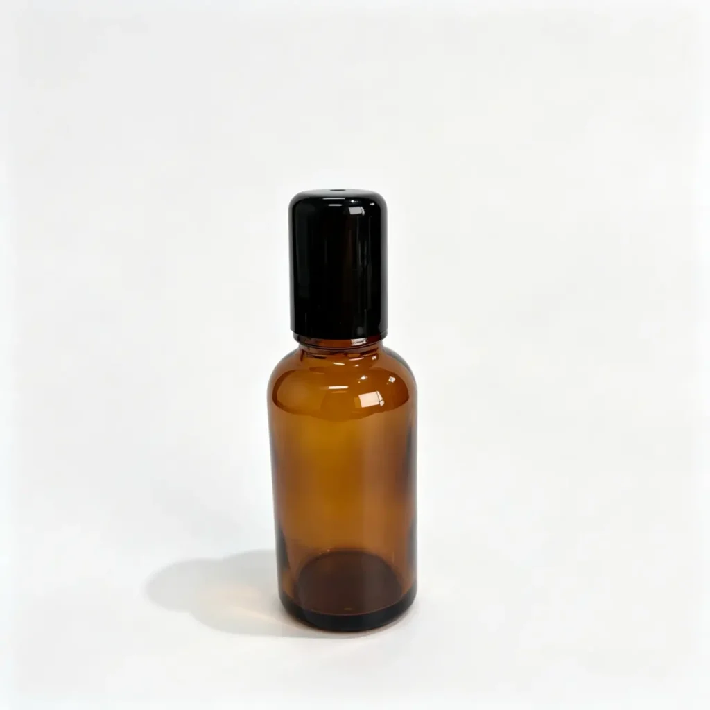 30ml amber glass roll on perfume bottle shown upright with matching cap and rounded cylindrical bottle profile