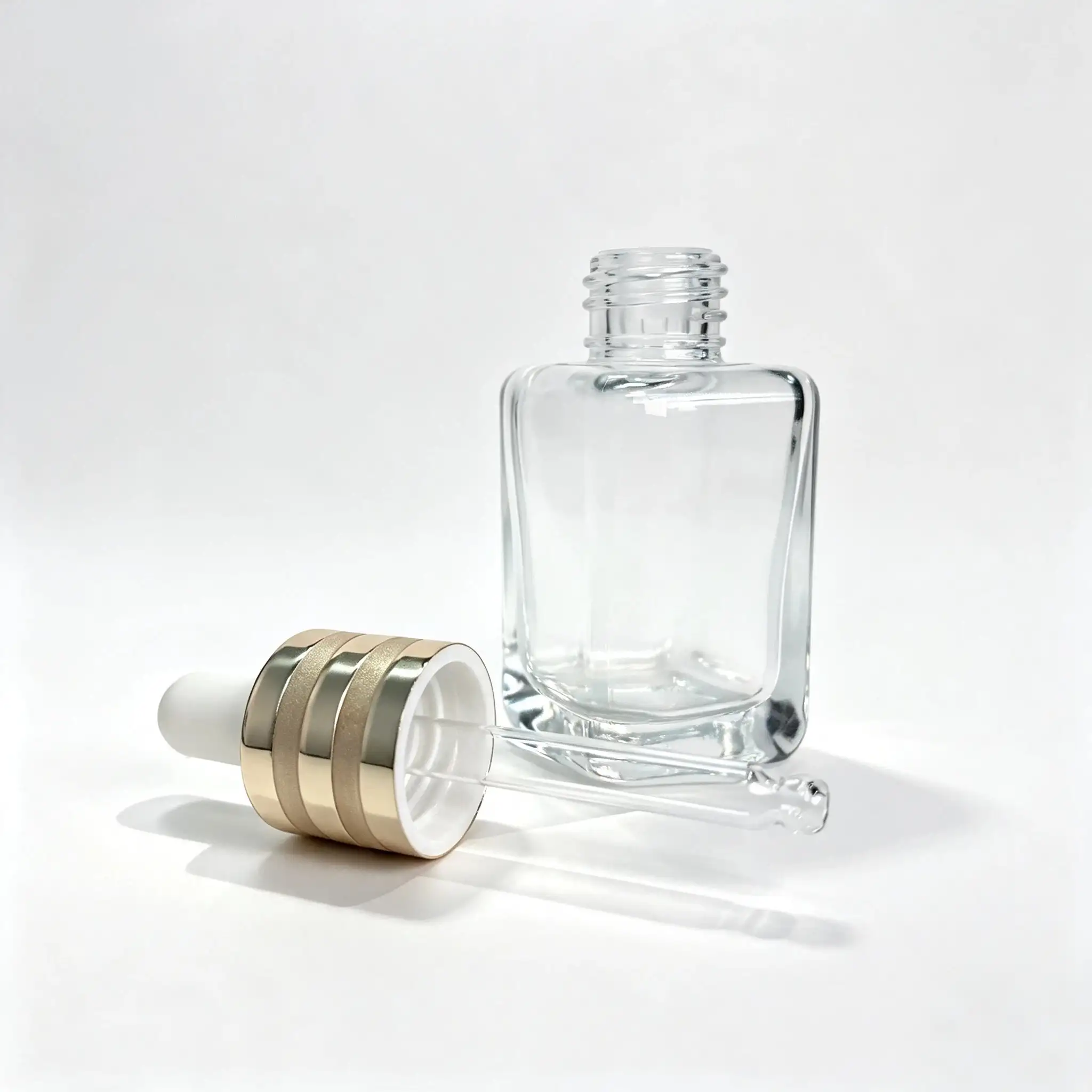 30ml Glass Serum Dropper Bottle with Cap and Dropper 30ml glass serum bottle displayed with its separate cap and dropper components