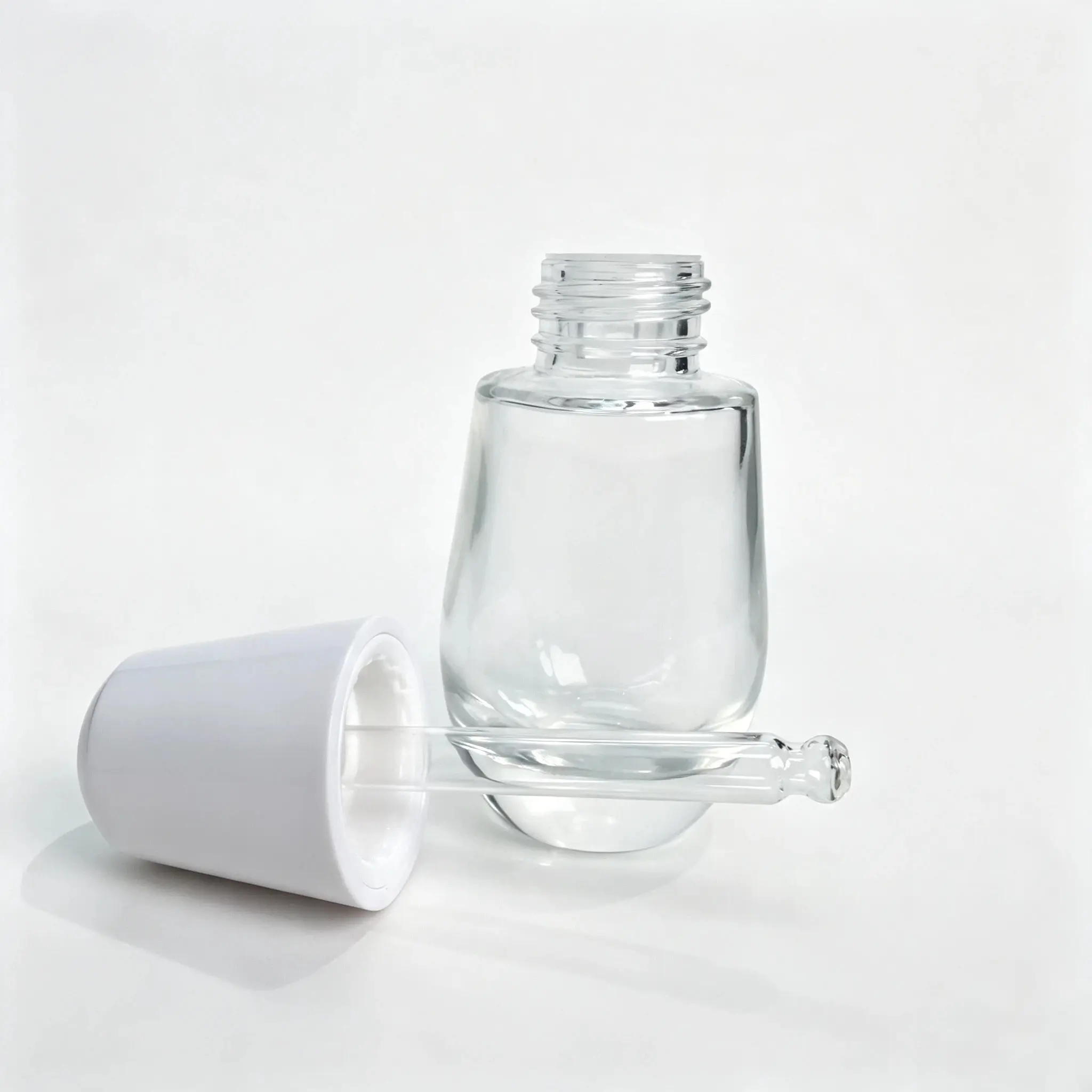30ml Glass Serum Dropper Bottle and Dropper 30ml glass serum dropper bottle displayed with its separate dropper component for component evaluation