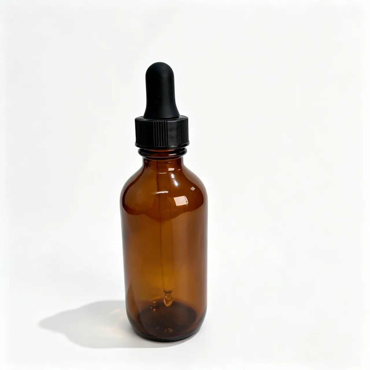 30ml-Gold-Boston-Round-Oil-Bottle-Front-View 30ml gold Boston round oil bottle with dropper shown upright from the front