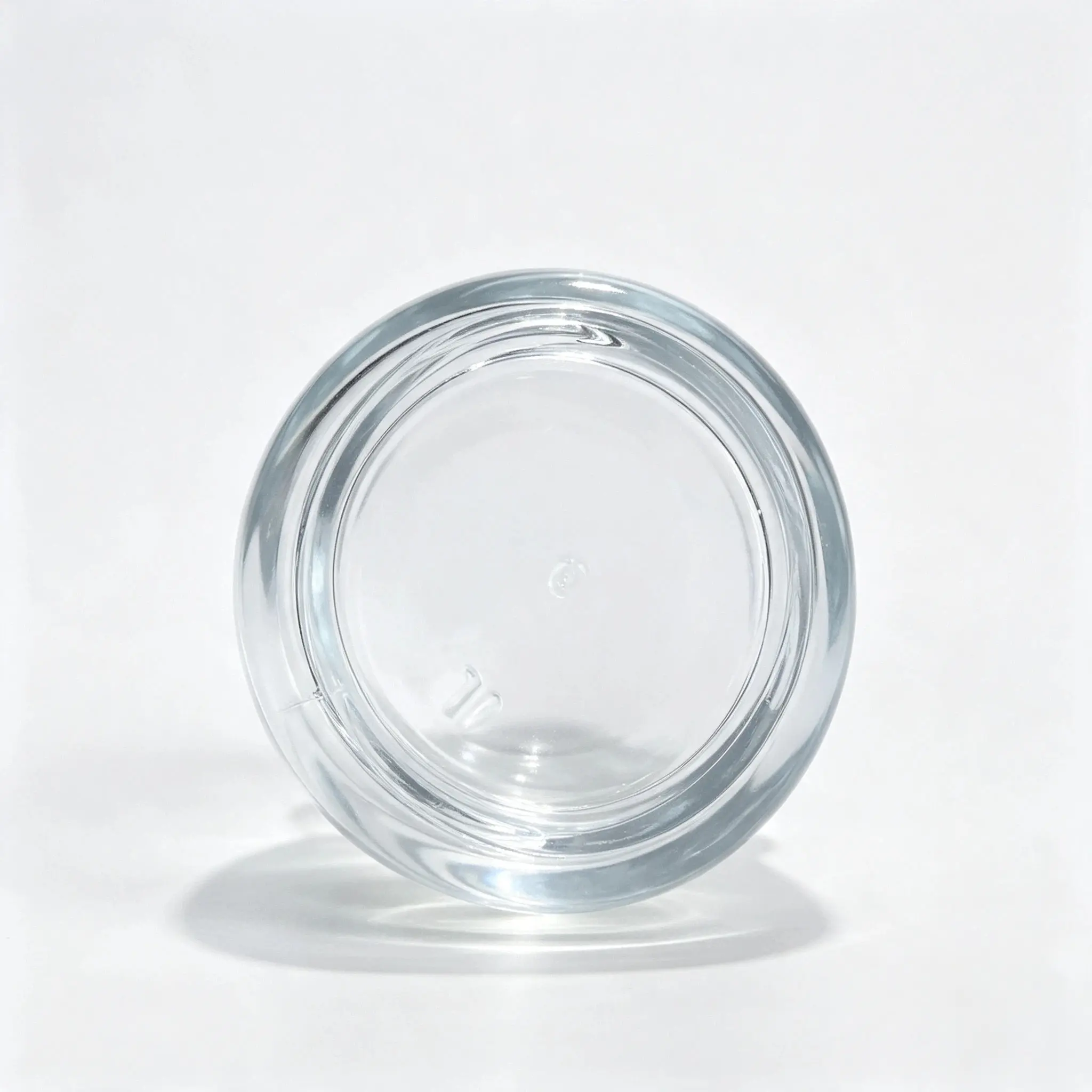 Bottom view of the 30ml serum dropper bottle showing the bottle base and compact footprint