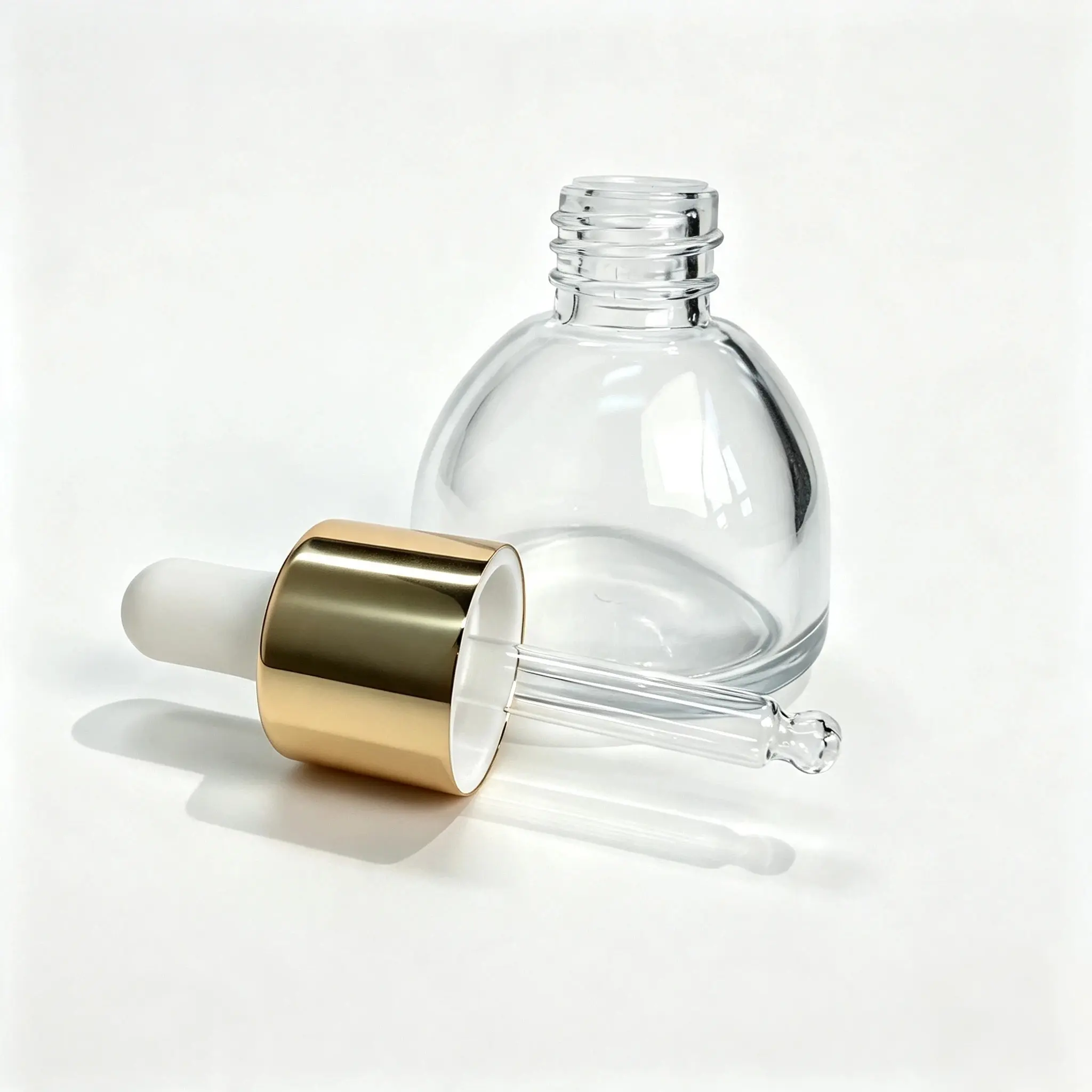 30ml serum dropper bottle displayed together with its separate dropper assembly