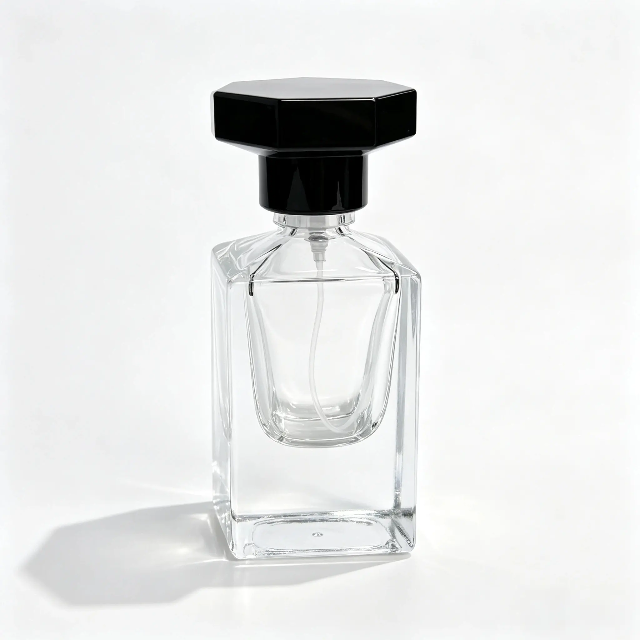 30ml Square Glass Perfume Bottle Front View 30ml square glass perfume bottle shown in complete front view with crimp sprayer and octagonal black outer cap