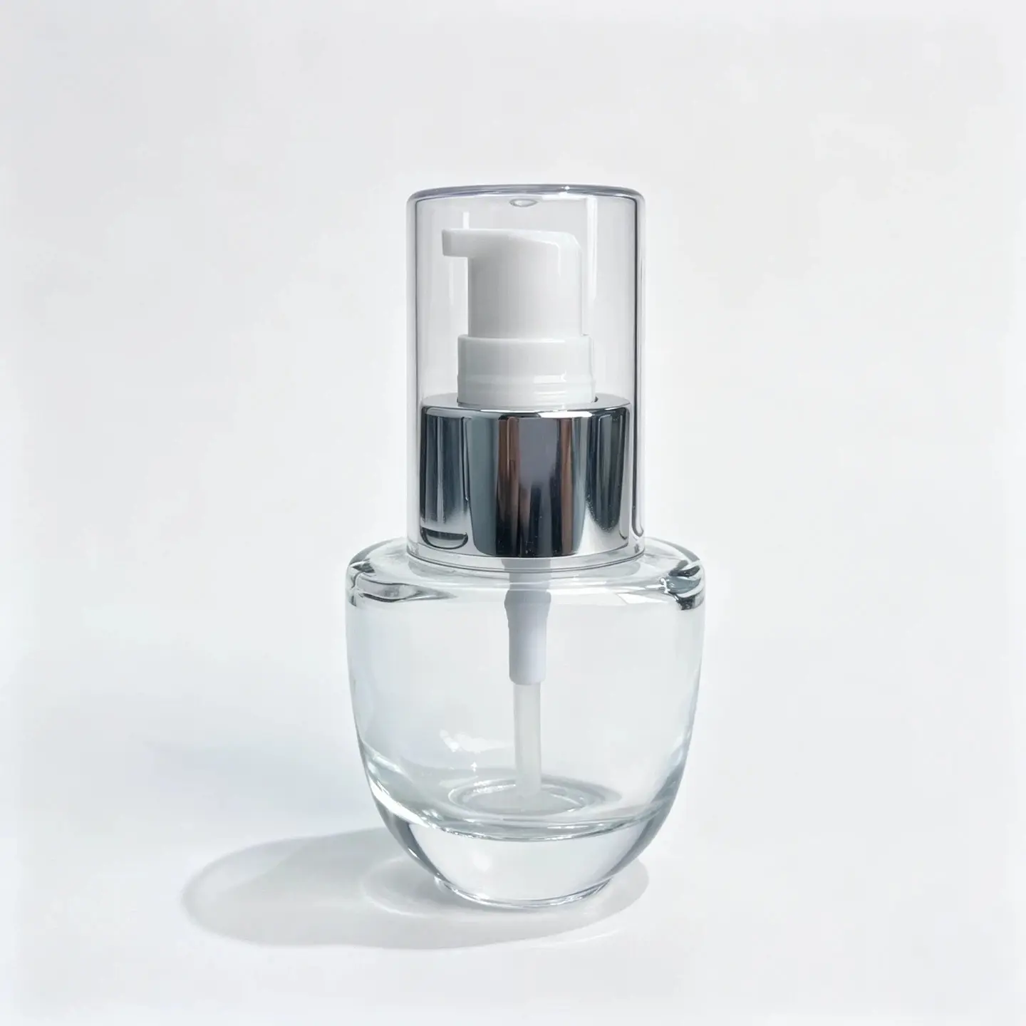 30ml Transparent Lotion Bottle Front View Front view of the assembled 30ml transparent lotion bottle with its dispensing closure components