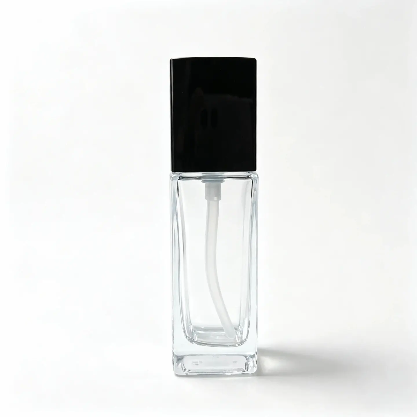 Front view of the assembled 50ml clear glass lotion bottle with sprayer collar and protective cap
