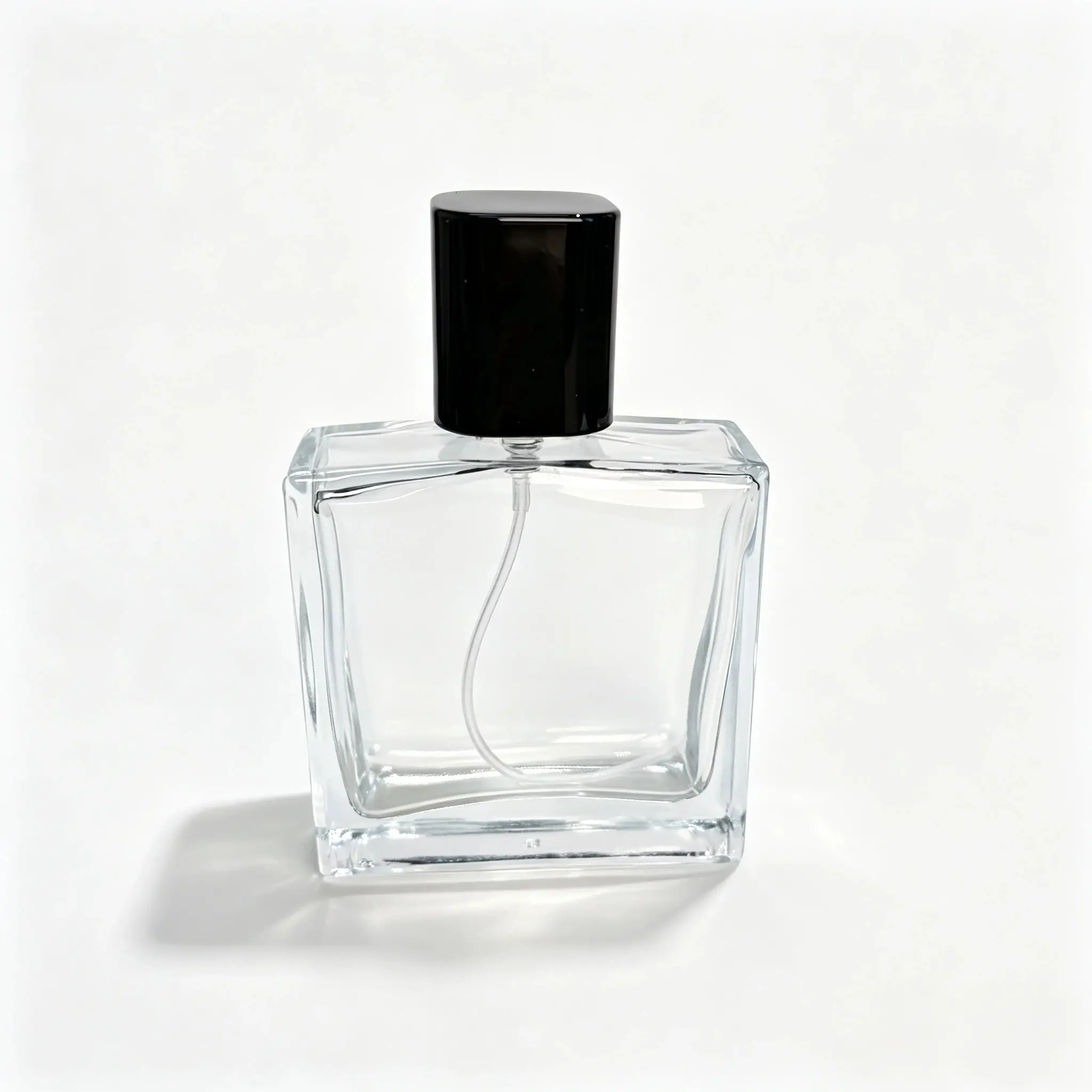 50ml Custom Faceted Perfume Bottle Front View 50ml custom faceted perfume bottle shown in complete front view with crimp sprayer and outer cap