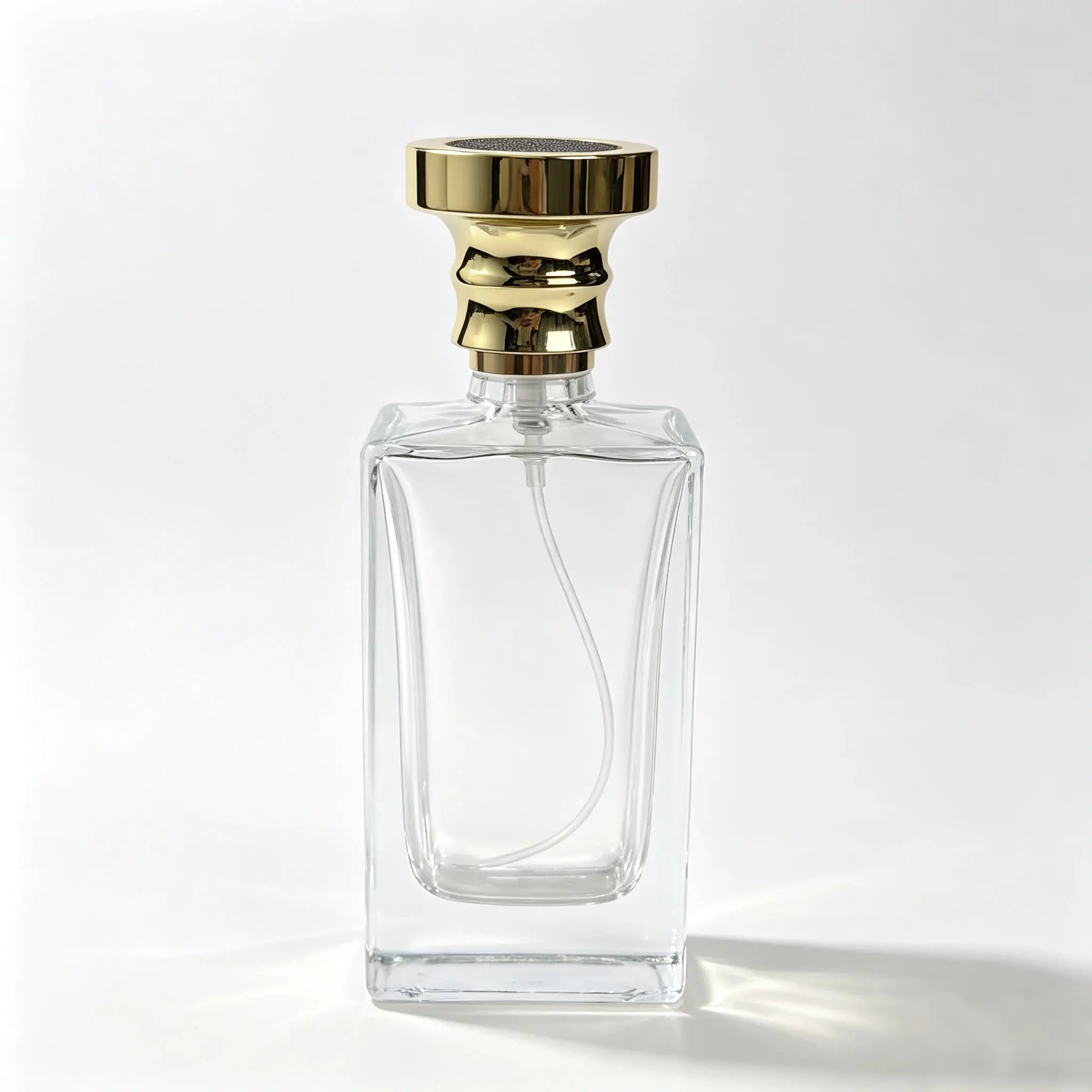50ml custom rectangular perfume bottle shown in complete front view with crimp sprayer and gold crown style outer cap