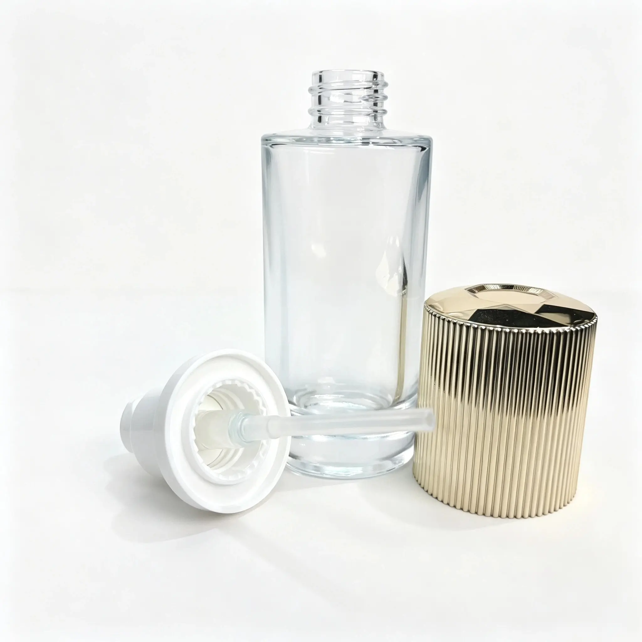50ml glass lotion bottle displayed with its separate cap and dispensing pump components for packaging configuration reference
