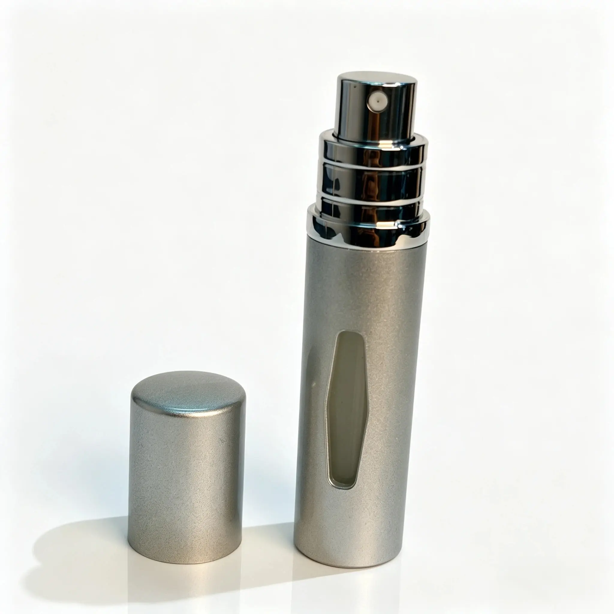 5ml portable perfume atomizer shown with assembled bottle body and cap standing separately beside it