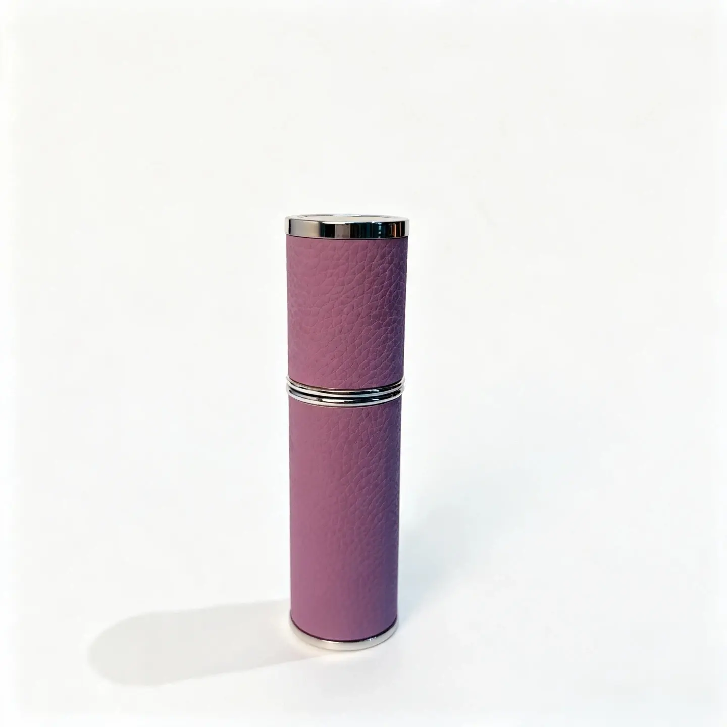 5ml Travel Perfume Atomizer Leather Grain Back Detail 5ml travel perfume atomizer rear view highlighting the leather grain surface detail and metal trimmed outer shell
