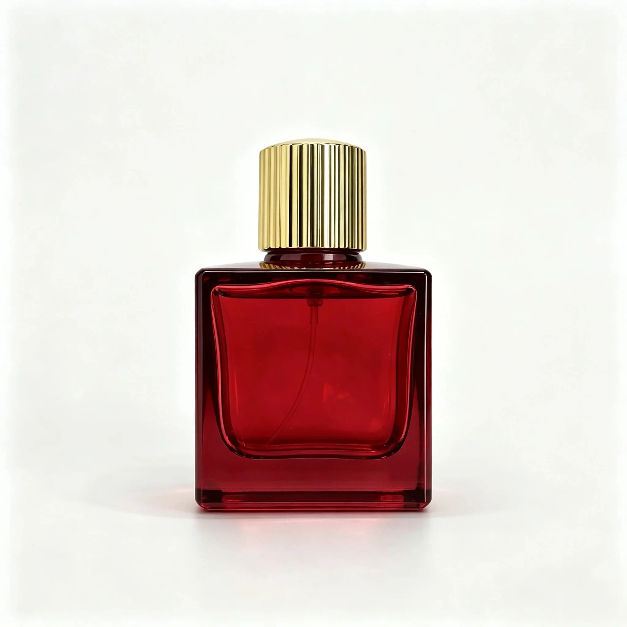 70ml red square glass perfume bottle shown in complete front view with crimp sprayer and gold striped outer cap