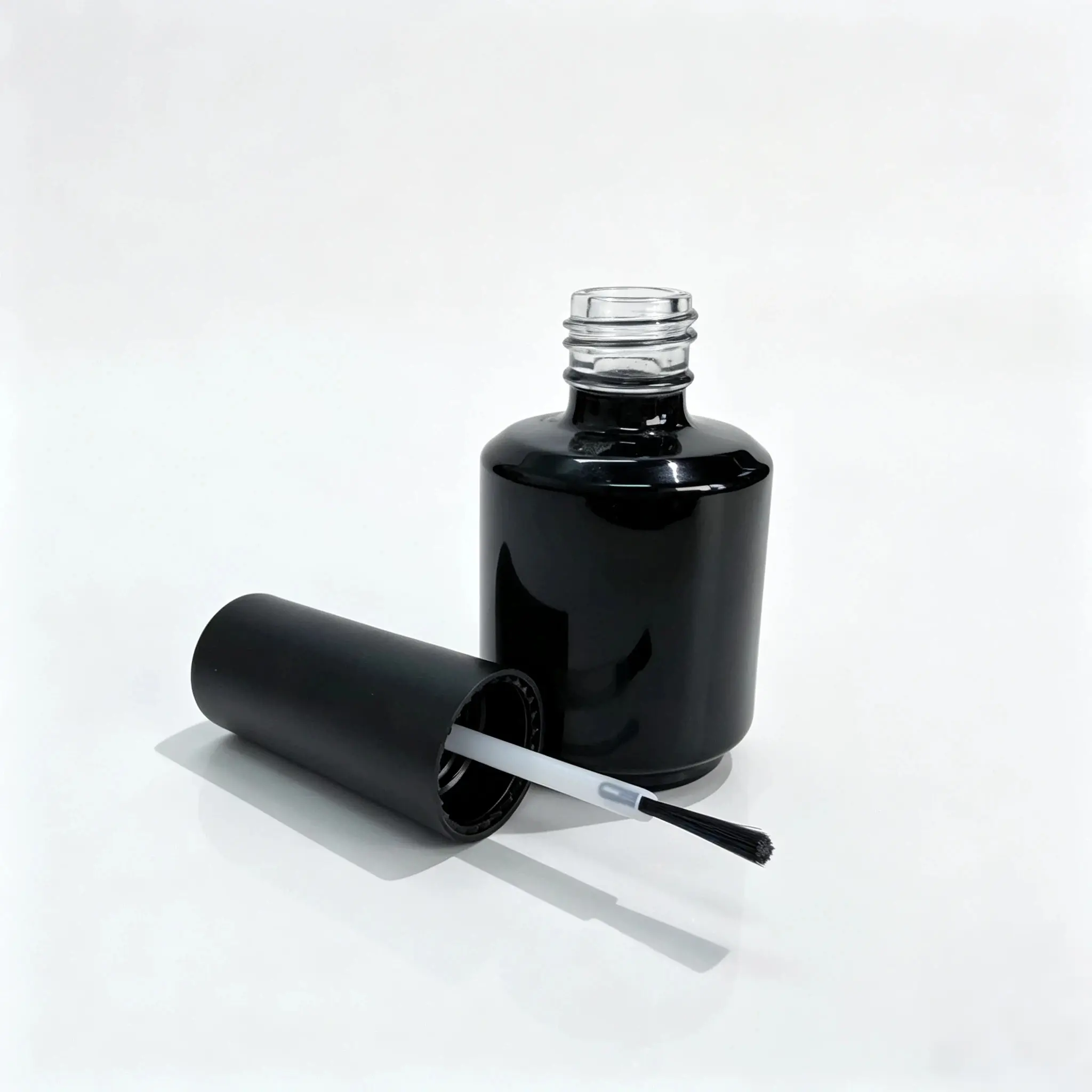 8ml Empty Nail Polish Bottle with Cap and Brush 8ml empty nail polish bottle displayed together with cap and brush components for packaging development.