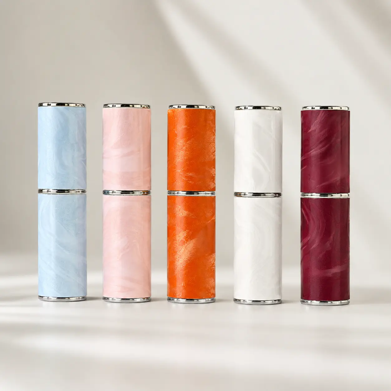 8ml Travel Perfume Atomizer Color Options 8ml travel perfume atomizers displayed in selectable color combinations with marble-pattern outer shells and coordinated trim