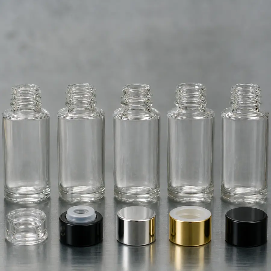 Representative cosmetic glass bottle necks showing normal dimensional variation