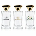 Custom logo printing reference for the 100ml rectangular perfume bottle showing proposed branding and decorative artwork on the bottle body.
