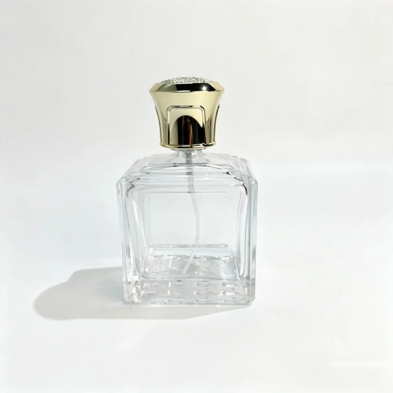 100ml square perfume bottle with a decorative front nameplate and ornate crown-shaped cap, shown in a complete front view.