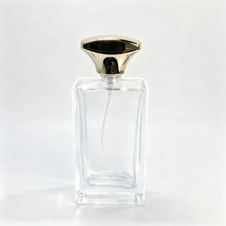 Front view of the 100ml tall rectangular glass perfume bottle showing its thick base and assembled cap.