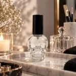 15ml skull-shaped glass nail polish bottle presented in a product display setting.