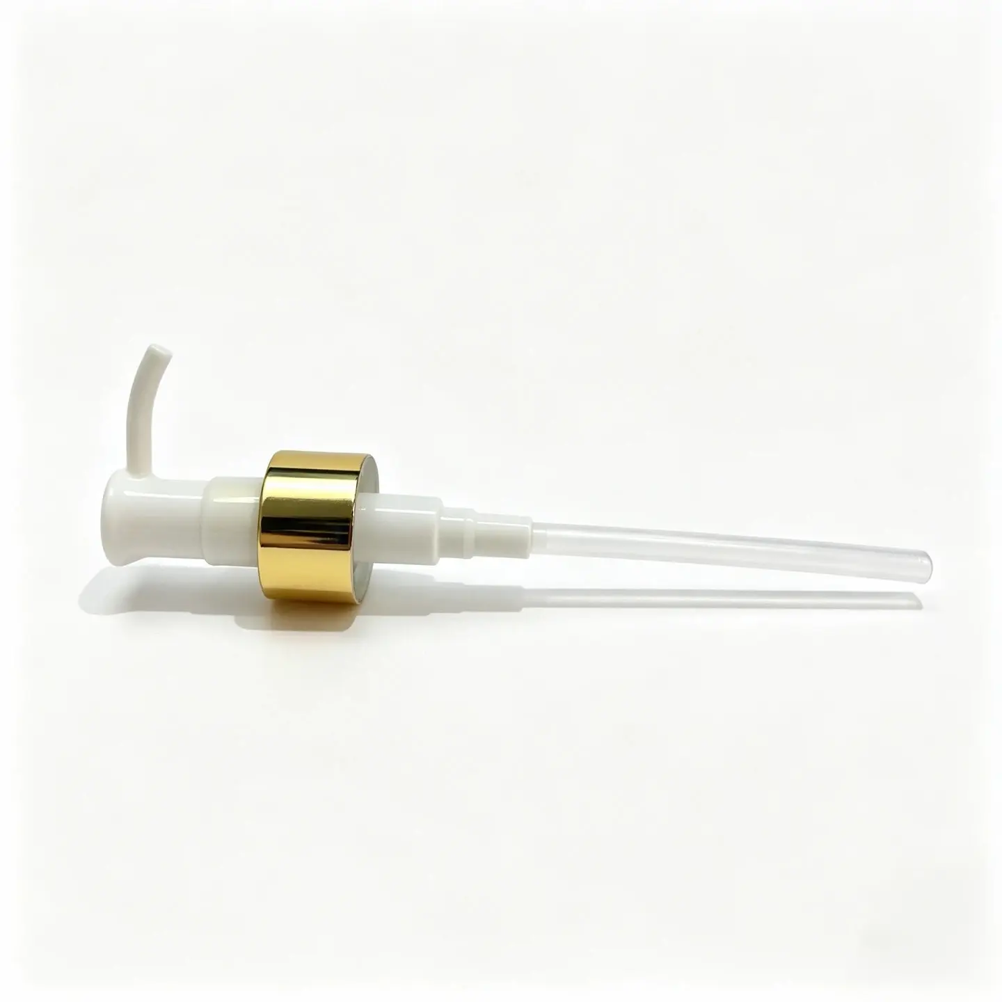 Side profile of the 24/410 gold lotion pump showing the actuator and pump body