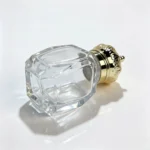 30ml Crown Diamond perfume bottle positioned on its side to show the bottle base and its relationship to the overall container shape.