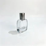 Side profile of the 30ml flat rectangular perfume bottle highlighting its narrow 29mm depth, rounded body edges, and gray straight cap.