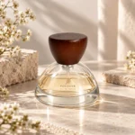 30ml fragrance bottle with a rounded wooden cap presented in a perfume display setting.