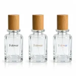 Custom logo printing reference for the 40ml square perfume bottle with a wooden cap, illustrating proposed branding arrangements for fragrance packaging.