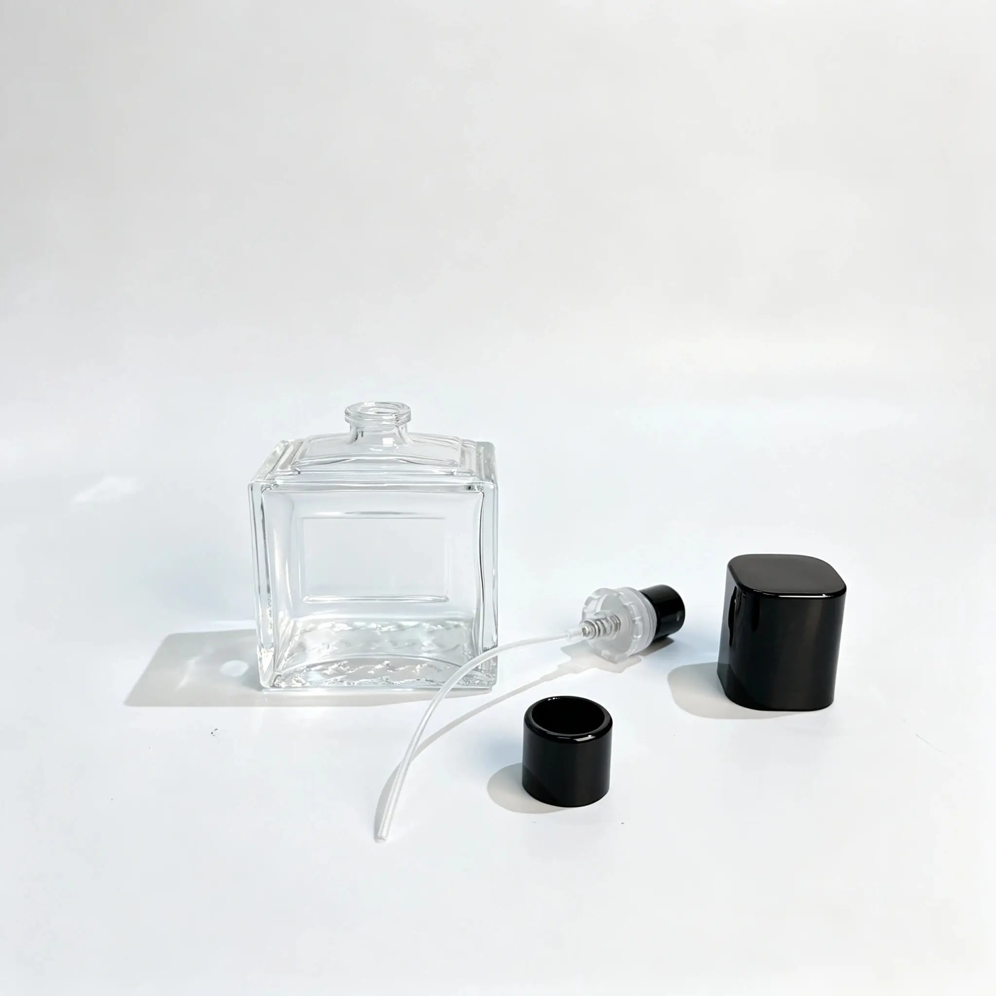 50ml Perfume Bottle Sprayer Dip Tube and Cap Components 50ml embossed perfume bottle with separate sprayer dip tube and glossy black cap components