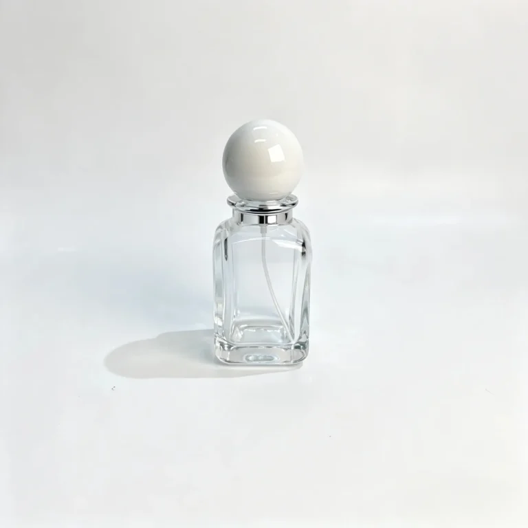 Front view of the 50ml square perfume bottle featuring a white spherical cap above the square bottle body.