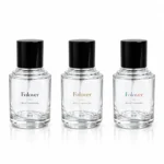50ml kademeli boyunlu parfüm şişesi için özel logo baskı referansı; silindirik gövdesi üzerinde önerilen marka tasarımlarını göstermektedir.