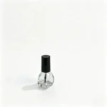 side view showing the tapered profile and wider base of the 5ml glass nail polish bottle